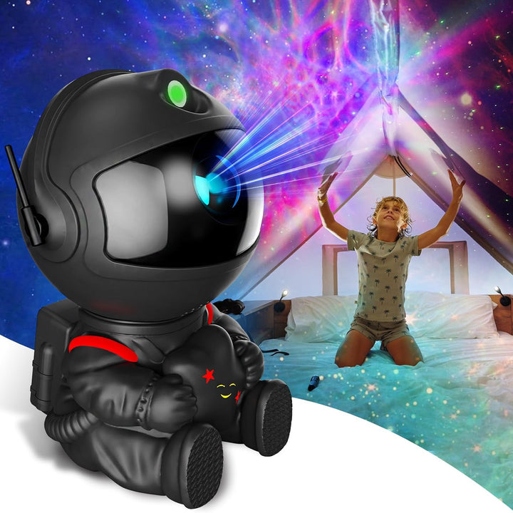 Night sky projector in the form of a cosmonaut with a star